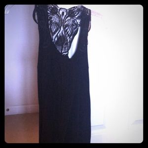 Sleeveless black top with butterfly back